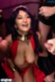 Kneeling in red dress big breasts
