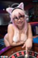 Bending over roulette wheel showing cleavage