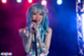Standing at microphone