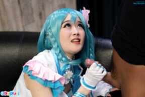 Ria Kurumi sitting at dinner table giving handjob