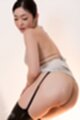 Looking back cum on her ass in stockings