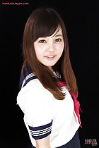 Kogal in seifuku uniform long hair falling over her chest