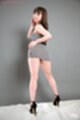 Katou tsubaki showing her ass off looking over her shoulder in black high heels