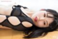 Lying on her back