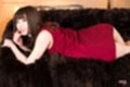 Katou tsubaki lying on her front wearing dress