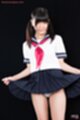 Raising uniform skirt showing white panties