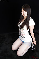 Iori Sana kneeling down long hair over her chest wearing tshirt in pantyhose hands on her high heels