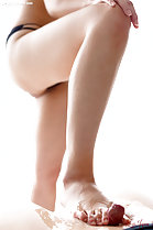 Giving footjob with bare foot