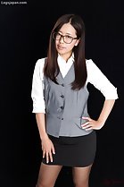 Fukatsu Miyuki with hand on hip in short skirt