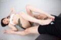 Rubbing spent cock between her bare feet knees raised