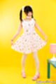 Shinjo nozomi in pigtails playing with her dress high heels