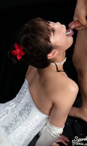 Komatsu Aya on her knees wearing basque and stockings cum in mouth