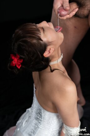 Komatsu Aya on her knees wearing basque and stockings cum in mouth