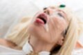 Mizuki glazed with cum tongue out