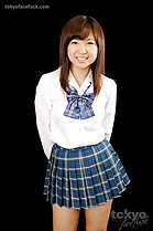 Cutie Aina Yuka in student uniform hands behind her back