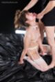 Kneeling nude masturbating with vibrator wearing stockings small breasts cumming on her face