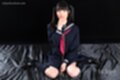 On her knees wearing uniform hair in pigtails