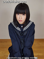 Kogal kneeling on floor wearing seifuku uniform
