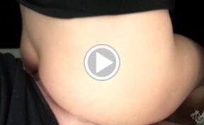 Madoka Yukishiro standing naked stroking cock and giving assjob